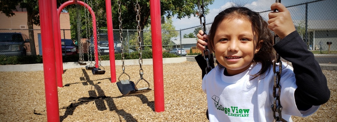 Student on the swing on the playground